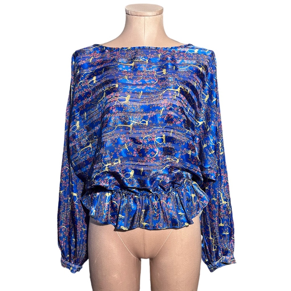 Free People blue long sleeve top in S. Elastic bottom. Sheer stripes. Gorgeous